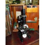 A Cooke, Troughton & Simms of York microscope with accessories & mahogany box
