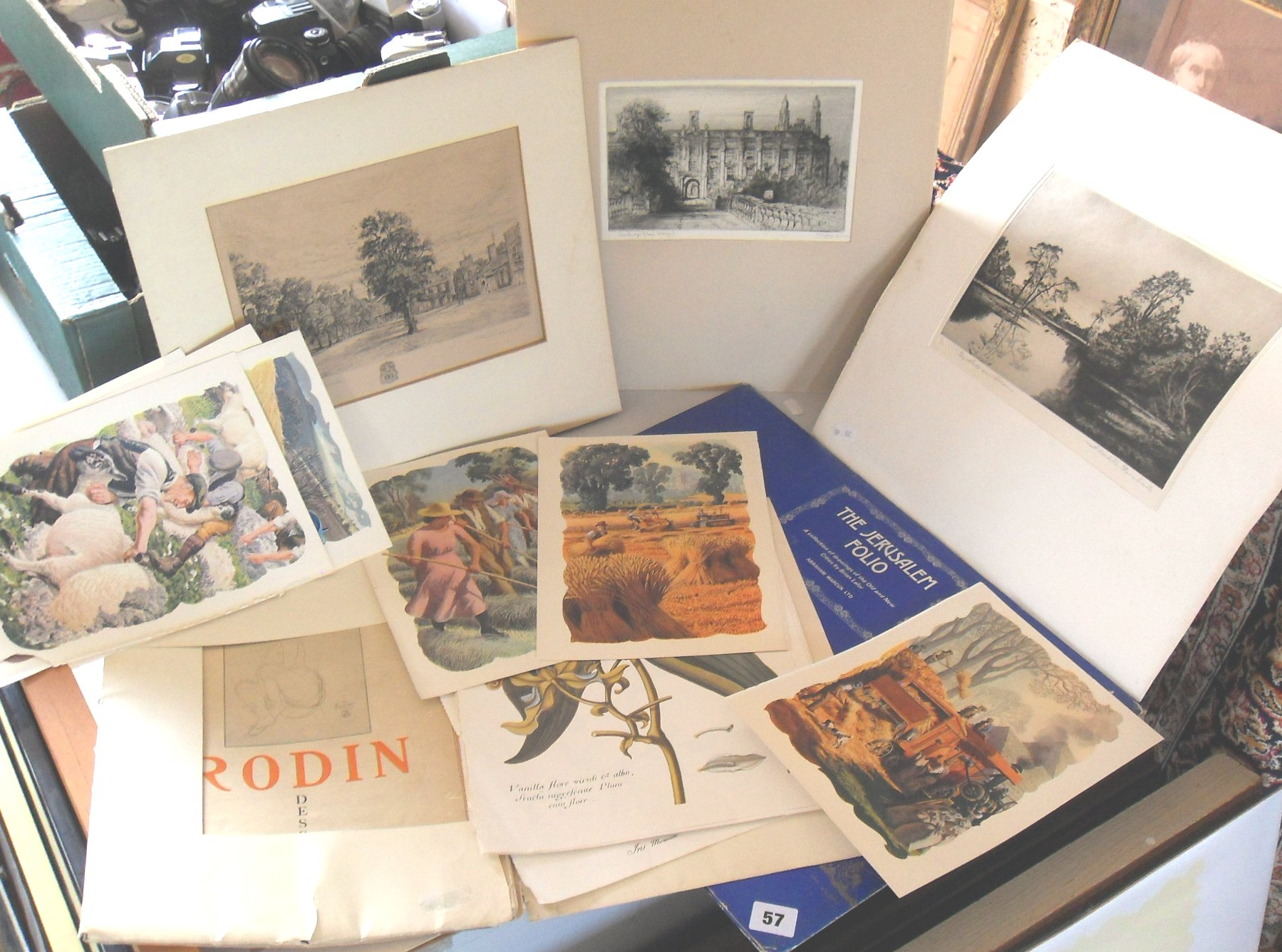 Folios of coloured prints & etchings by various artists including Wallace Heaton, A. Watson Turnbull