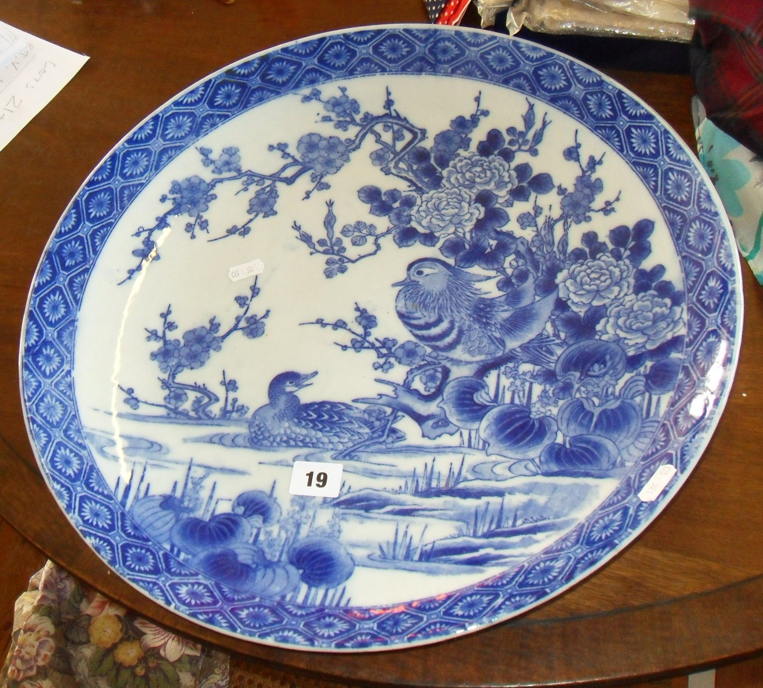 Oriental blue & white charger with bird decoration, 18" diameter