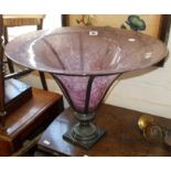 Large contemporary purple glass bowl on iron stand,and a wall mirror