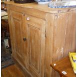 Victorian pine two-door cupboard with shaped top