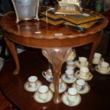 Walnut coffee table, and eight yew wood veneered photo frames