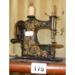 Child's tin-plate sewing machine