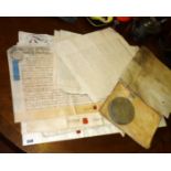 Collection of early 18th & 19th c indentures etc including George III document with seal in tin