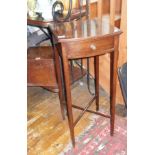 Small bow-fronted mahogany side-table on square tapering legs