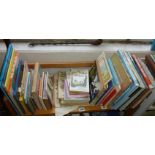 Shelf of assorted children's books