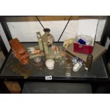 Collection of assorted items including WW2 shell fuse, a pair of bookends with painted cold cast