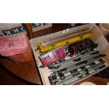 Boxed Hornby Series '0' gauge flat truck with container, 82011 engine, log wagon, another wagon