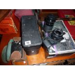 Canon T50 with two lenses, a Canon Motor Zoom *8 movie camera, and a Box Brownie