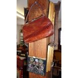 Crocodile skin handbag, and an Edwardian brass-mounted embroidered evening bag