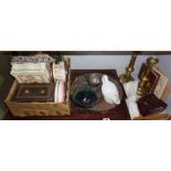 Shelf of assorted items including carved tray, a pair of brass candlesticks etc