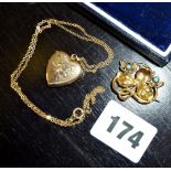 9ct gold locket on chain, and a 15ct leaf brooch inset with turquoise