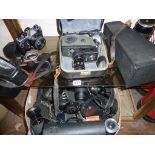 Large quantity of assorted cameras and lenses etc.