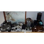 Twenty various old cameras and accessories