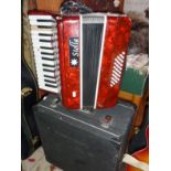 Stella piano accordion in case