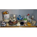 Shelf of assorted teapots & other ceramics