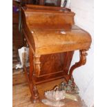 A Victorian burr walnut "jack in the box" Davenport, the lift-up top enclosing a pull-out tooled
