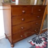 19th c. mahogany chest of five drawers with bun handles standing on bun feet