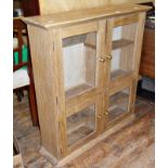 Light oak glazed four door wall cupboard with brass knobs on!