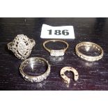 Four various gold and silver rings