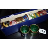 Eight cloisonne napkin rings and two toothpick holders