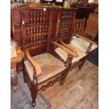 Pair of early 19th c. oak spindle-back open armchairs with rush seats