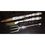 Victorian silver cutlery, a Walker & Hall bread fork Sheffield 1899, and an ornate handled silver