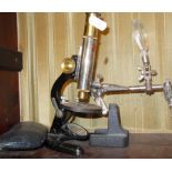 Junior microscope "octopus", a watchmaker's clamp/vice etc.