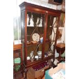 Edwardian mahogany two-door china cabinet on cabriole legs