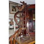 Turned wood upright spinning wheel