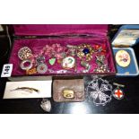 Bundle of costume jewellery with silver watch fob, enamel badges, silver? propelling pencil inset