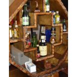 Collection of miniature bottles of spirits, whisky, rum etc, together with a 1999 bottle of Thomas