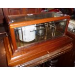 Negretti & Zambra barograph in mahogany case with chart drawer