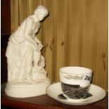 Victorian souvenir cup and saucer with black and white transfer of West Bay, Bridport scenes and a