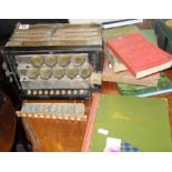 A Sovereign Accordion (A/F) with local interest books and a stamp album