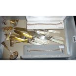 Silver necklaces in cases, both plated with 18k gold, silver-plated cutlery, cuff links etc.