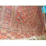 Large Bokara red ground carpet approx 72" x 86"