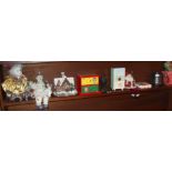 Shelf of Christmas figures and other items