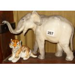 China elephant and a Russian china figure of a tiger cub