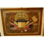 Victorian sailors woolwork picture with photographs of flags and a sail/steam frigate