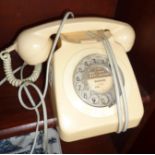 Cream plastic rotary-dial telephone