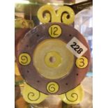 Studio Pottery purple and yellow glazed terracotta clock case made for Liberty's, marked "SB-RC"