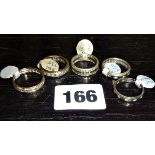 Five 9ct gold rings, some with inset stones