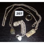 Sterling silver items:- pendants and necklaces, a link bracelet with padlock clasp and a ring