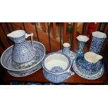 Shelf of blue & white china including washbowl, jug and chamber pot set, bowls, vases etc