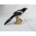 Beswick Pottery - a magpie finished in gloss 12.7 cm (h).