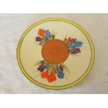 Clarice Cliff - a large plate decorated in the Crocus pattern,