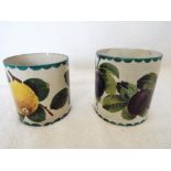 Wemyss - two early hand-painted cylindrical pots, one decorated with lemons 8.