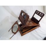 A walnut veneered Negretti & Zambra stereographoscope with brass mounts,