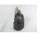 Lladro - a Lladro figurines depicting a Chinese monk 17 cm (h)